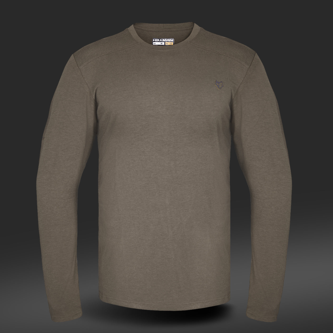The HILLMAN bamboo long sleeve hunting t-shirt—an ultralight, all-season base layer in olive green—features a crew neck, moisture control, and a small embroidered logo on the left chest, displayed against a dark gradient background.