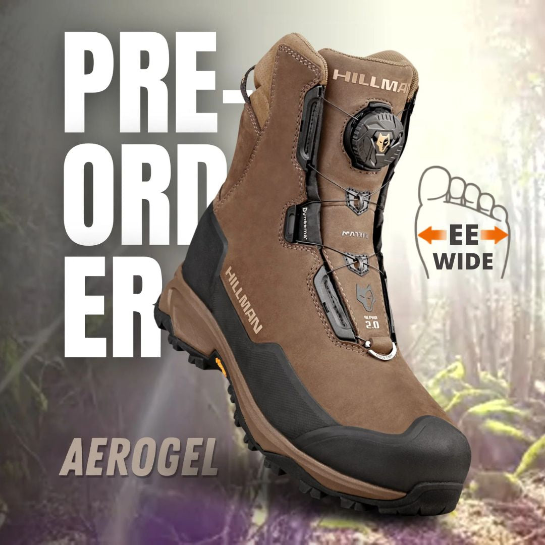 A brown PRE-ORDER | Wide Fit Insulated Hunting Boots | Aerogel 2.0 is shown outdoors, featuring black accents, thermal efficiency, and EE WIDE fit—ideal for those seeking wide fit hunting boots. Delivery from 25 Sep.
