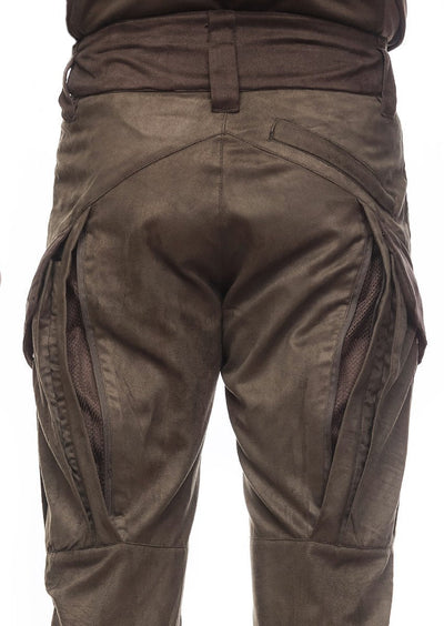 Close-up of a person wearing Hillman® XPR Silent Hunting Trousers in Camo, featuring multiple zippers and pockets. The durable fabric is ideal for outdoor activities and silent movement. The image captures the back view from waist to thighs.
